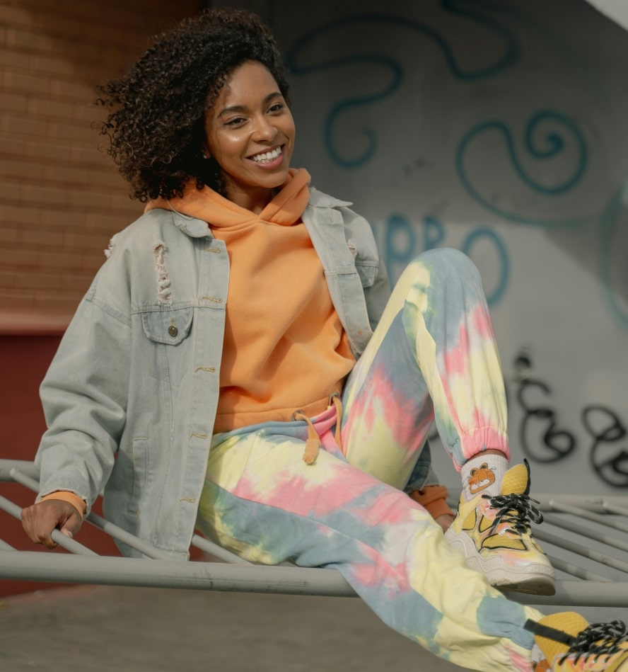 Orkini Lady Woman wearing fashion colorful pants and a hoodie